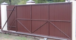 Купить откатные ворота из профнастила Горно-Алтайск, цена от 1736 руб.