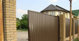 Купить откатные ворота из профнастила Горно-Алтайск, цена от 1736 руб.